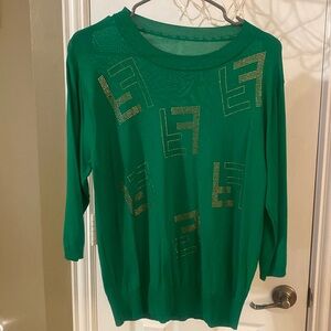 Beautiful green sweater. NWOT. Fits size M to L.